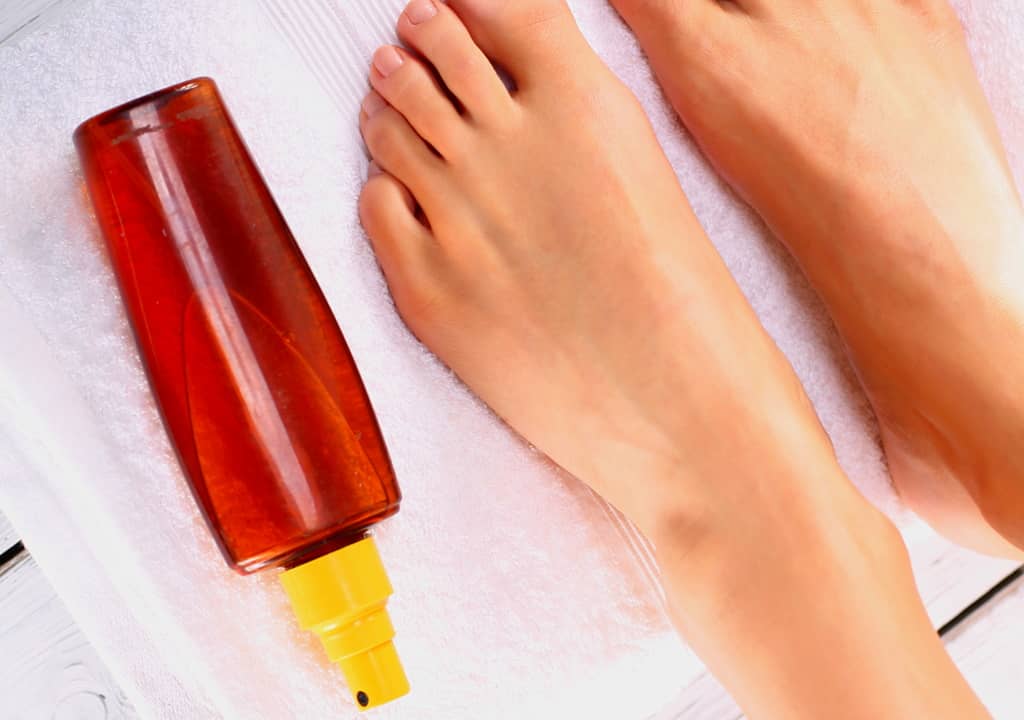 Quelles huiles essentielles appliquer sur les pieds pour enlever les cors et les durillons ?